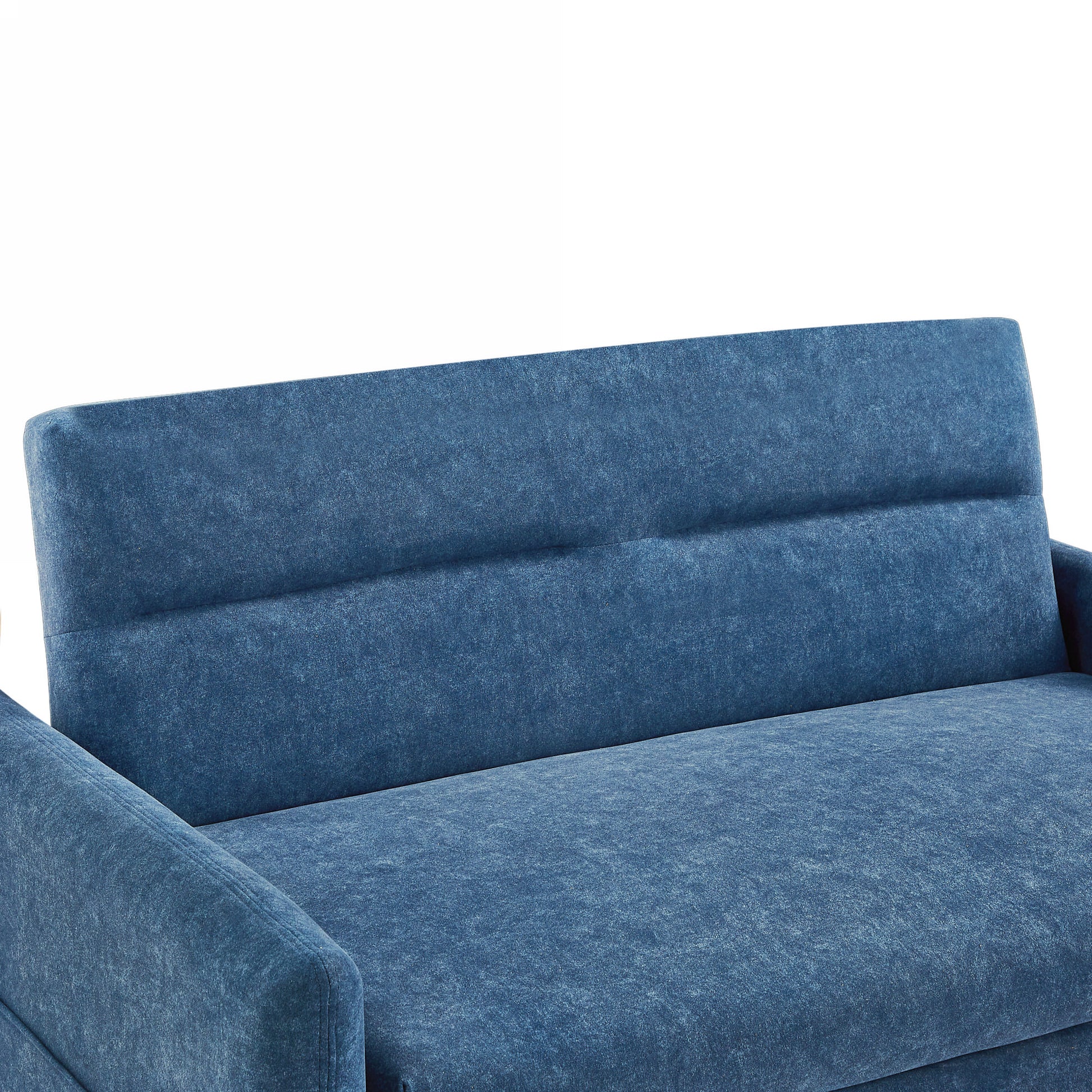 Closeup of a textured blue fabric sofa with channeltufted back
