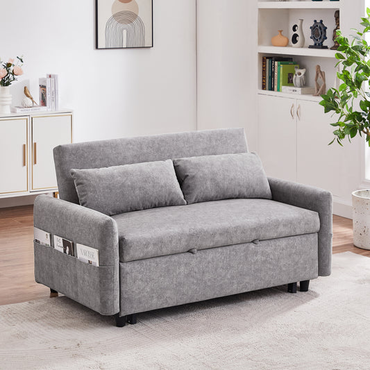 Grey fabric sofa bed with two plush cushions and side magazine pockets perfect for small spaces