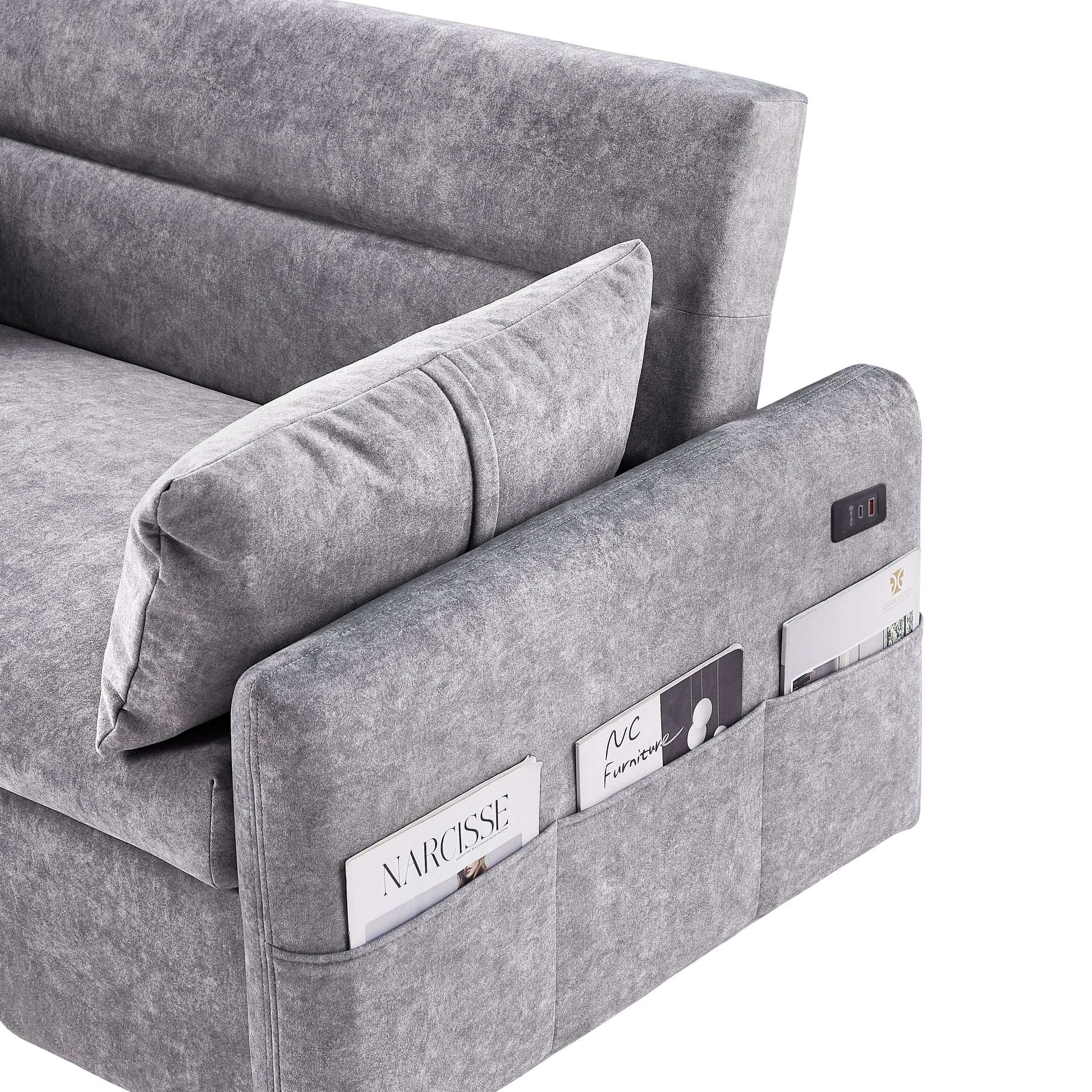 Gray upholstered sofa with builtin armrest magazine pockets and USB charging