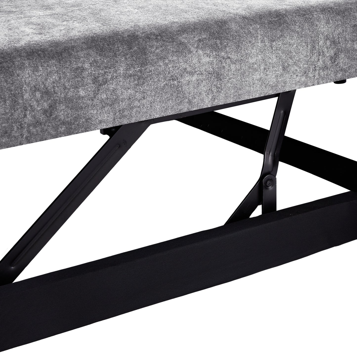 Closeup of gray upholstered bed frame with visible lift mechanism
