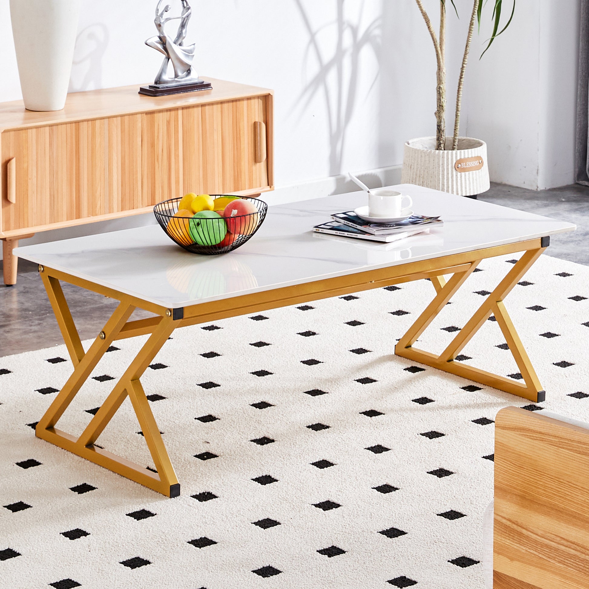 White marble top coffee table with gold Xframe legs