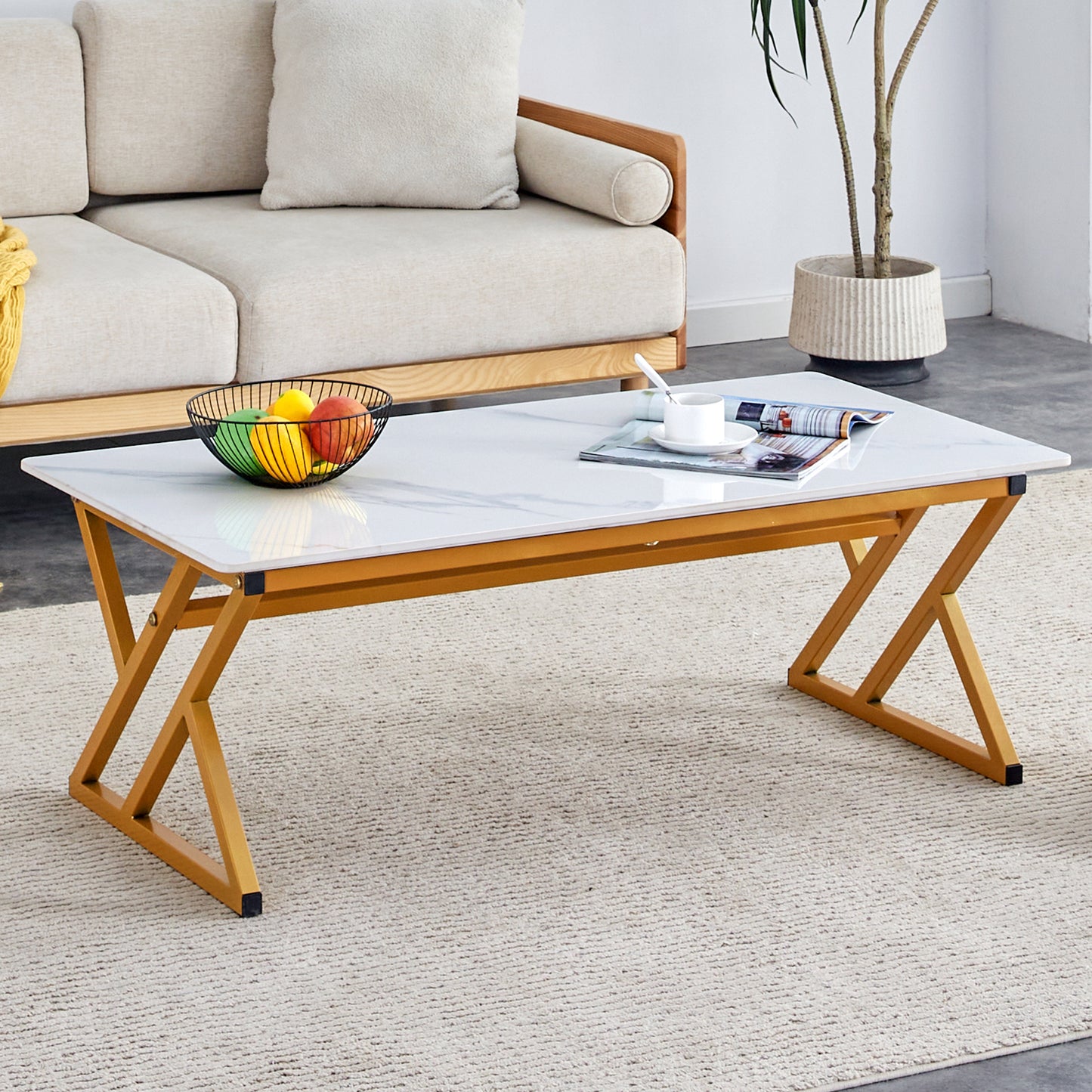 Marble top folding table with gold legs perfect for bedside use