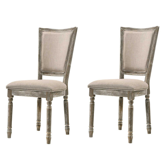 Two distressed grey wooden dining chairs with beige upholstered seats and backs