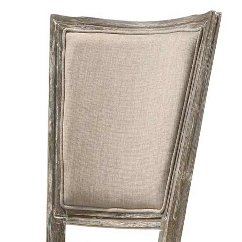 Rustic distressed wood dining chair with beige upholstered seat and back