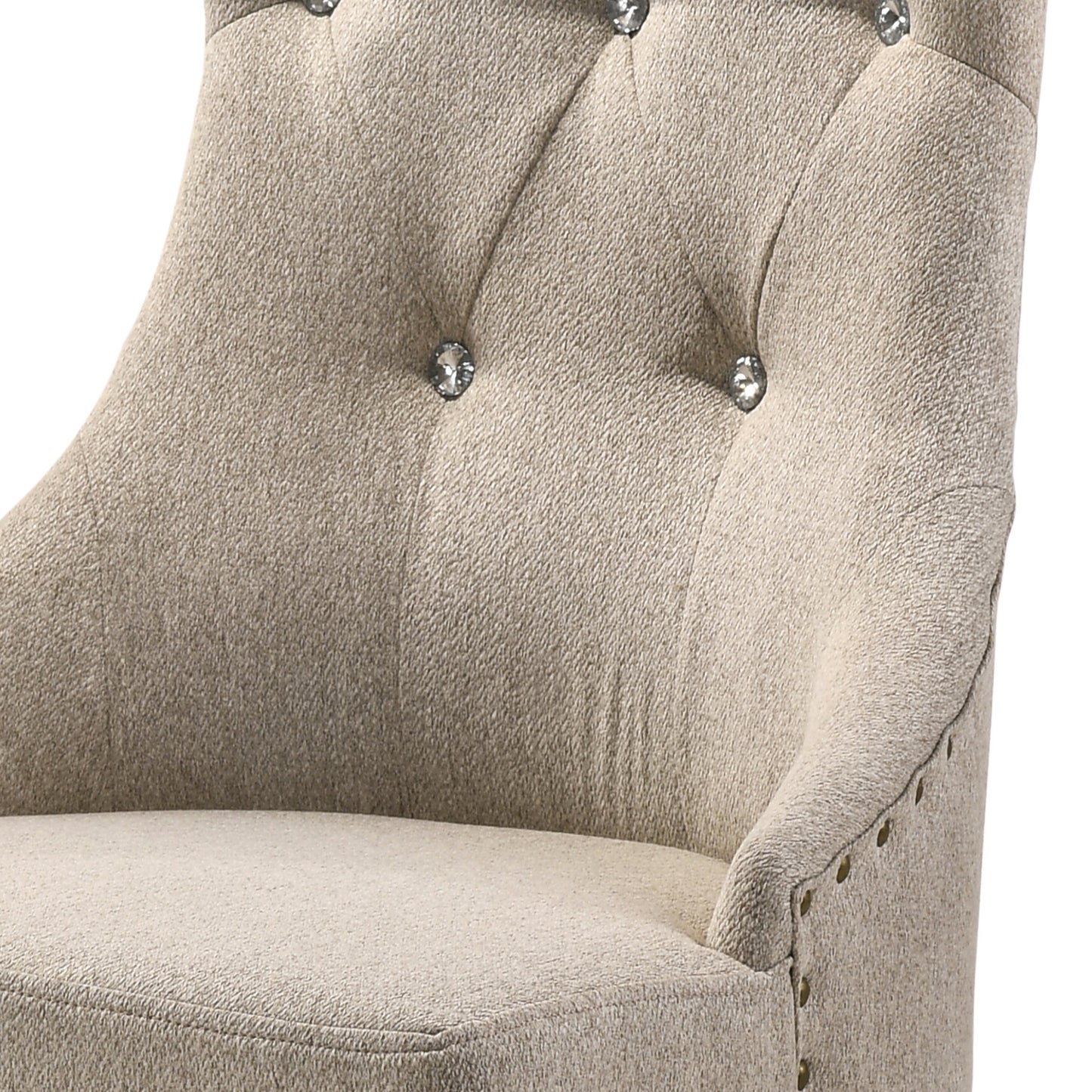 Beige linen accent chair with crystal tufting and brass nailhead trim