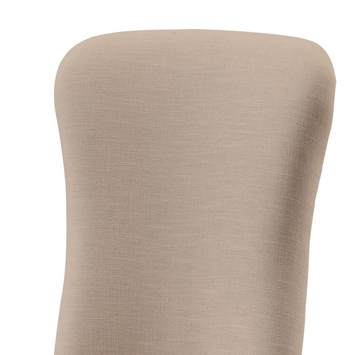 Closeup of a beige linen upholstered chair back showing textured fabric detail