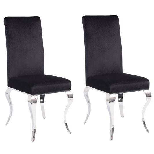 Pair of black velvet dining chairs with ornate silver legs elegant accent seating