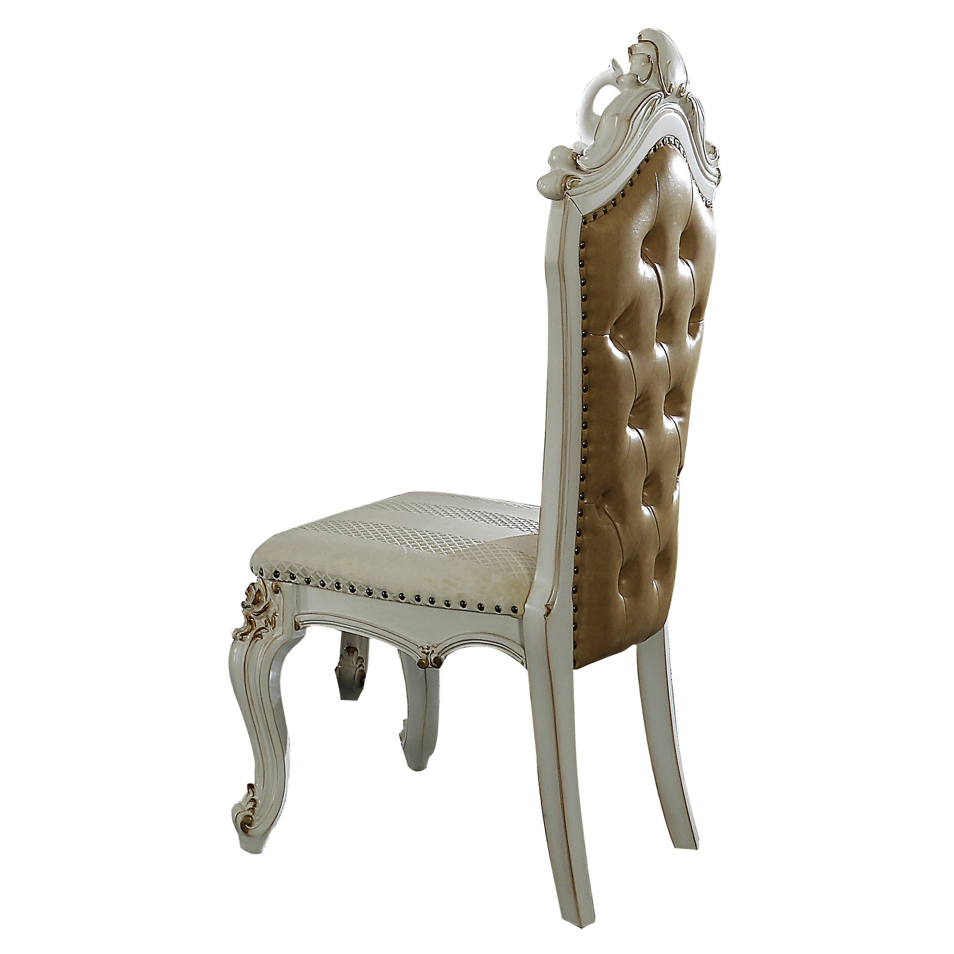Ornate antique dining chair with tufted taupe leather and cream upholstered seat