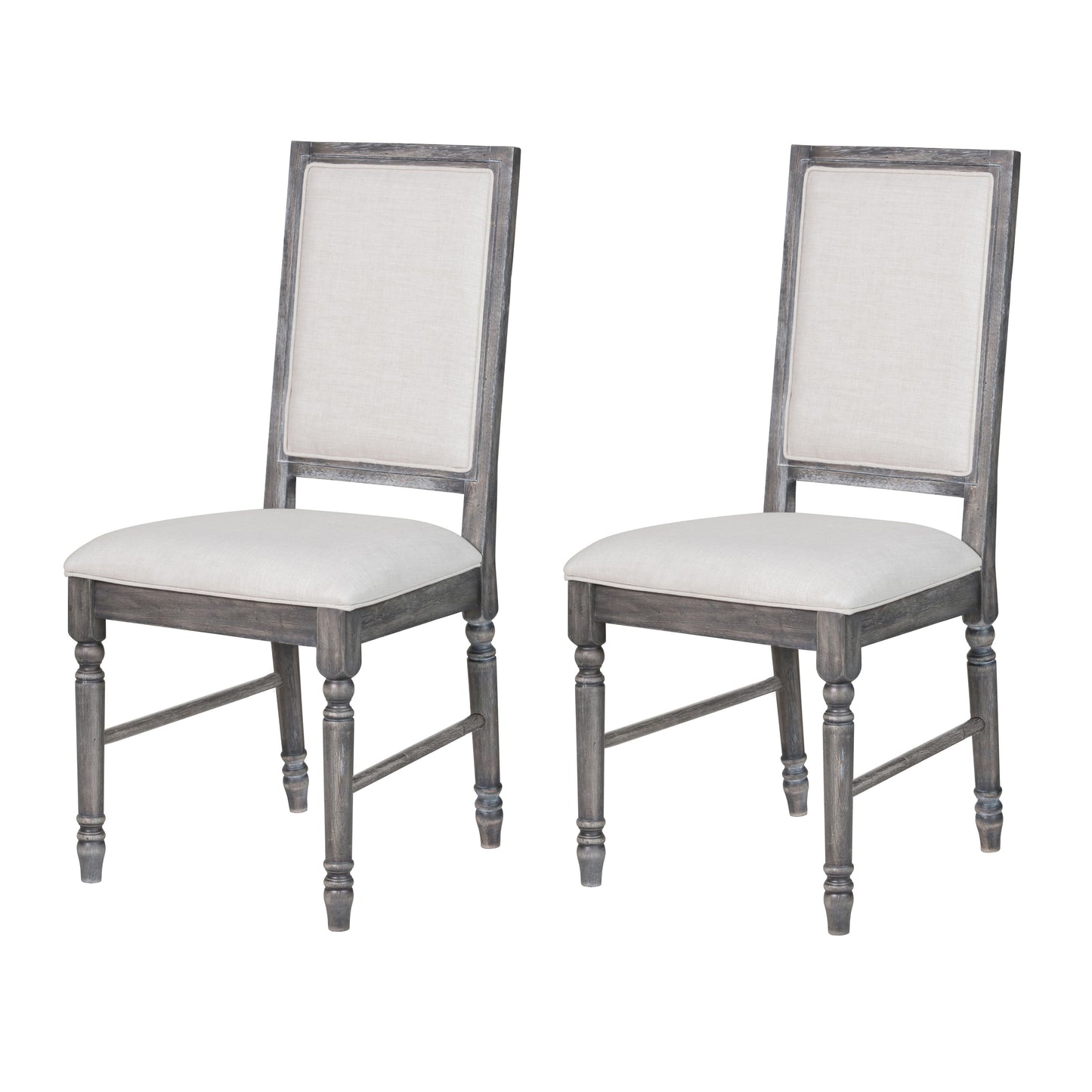 Two upholstered dining chairs with distressed gray wooden frames and light beige linen seats