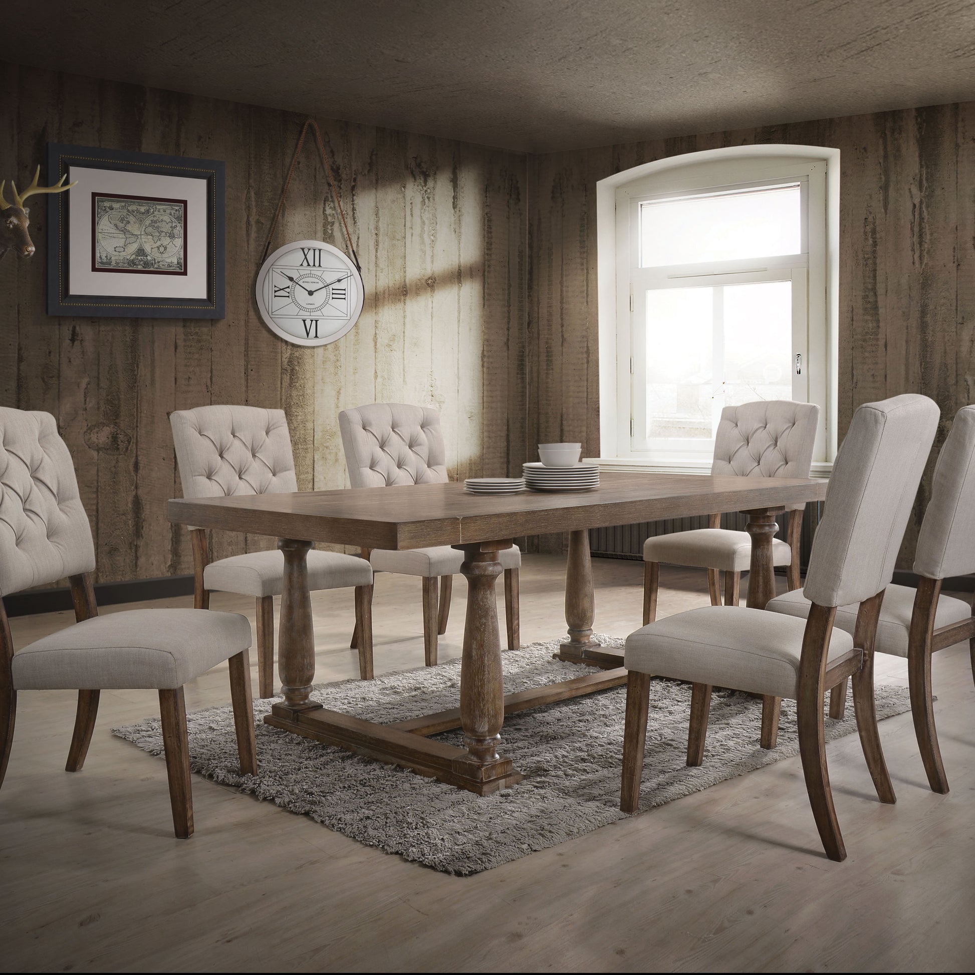 Rustic wood dining table with tufted linen chairs for a warm inviting dining room