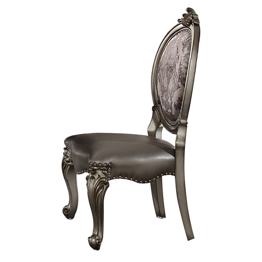 Ornate Louis XV style armchair with dark grey faux leather seat and upholstered back