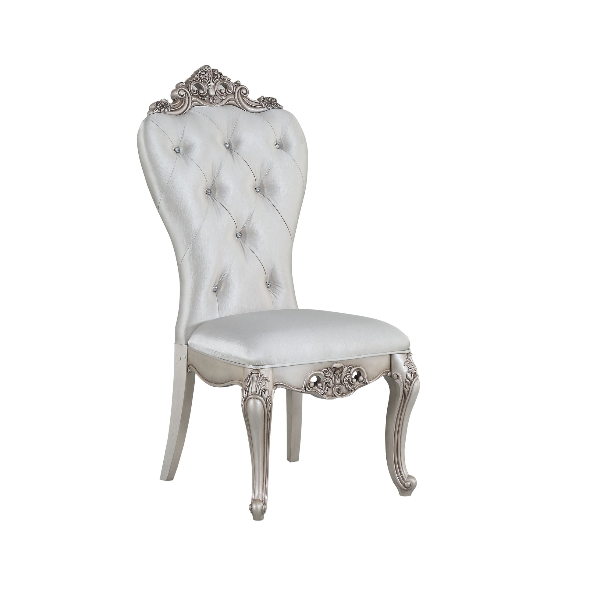 Tufted silver armchair with ornate carved legs and crystal accents regal dining chair