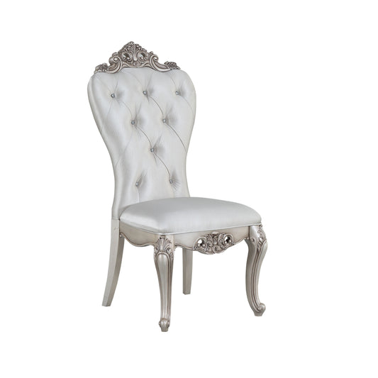 Tufted silver armchair with ornate carved legs and crystal accents regal dining chair