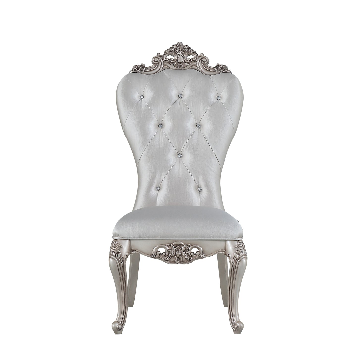 Silver tufted dining chair with ornate carved legs