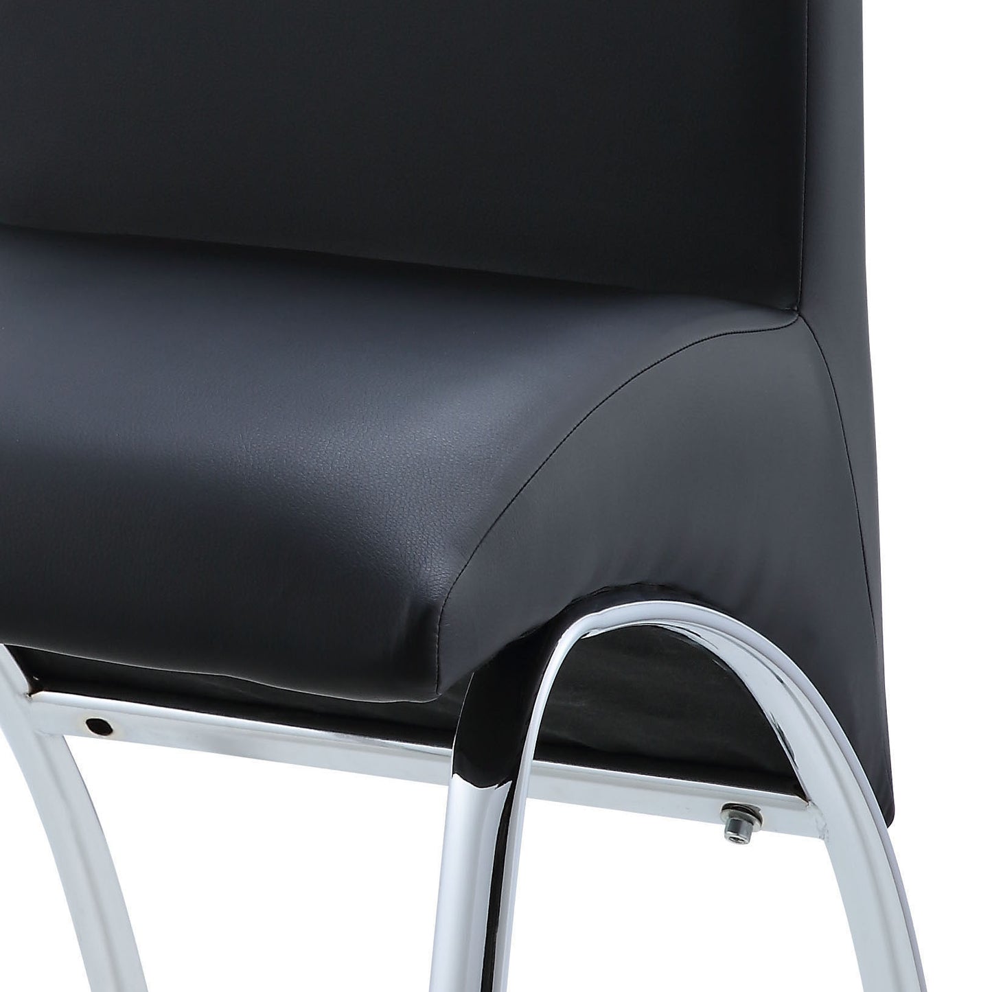 Black faux leather seat and chrome base of a modern bar stool