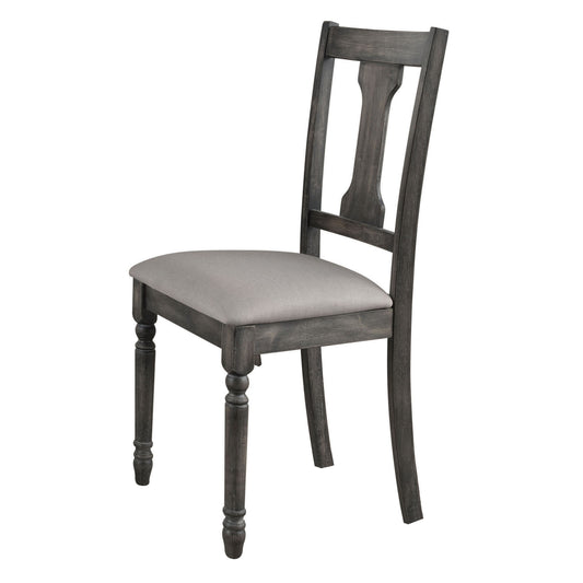 Distressed charcoal gray upholstered dining chair with turned front legs and carved back splat