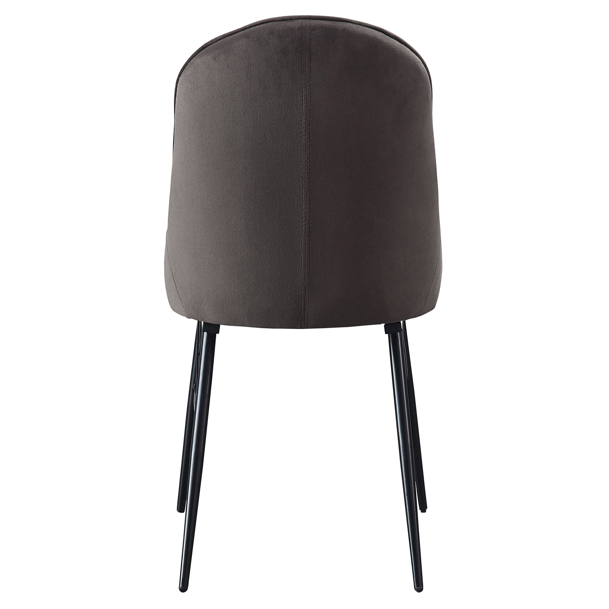 Dark gray velvet dining chair with a curved back and four slender black metal legs