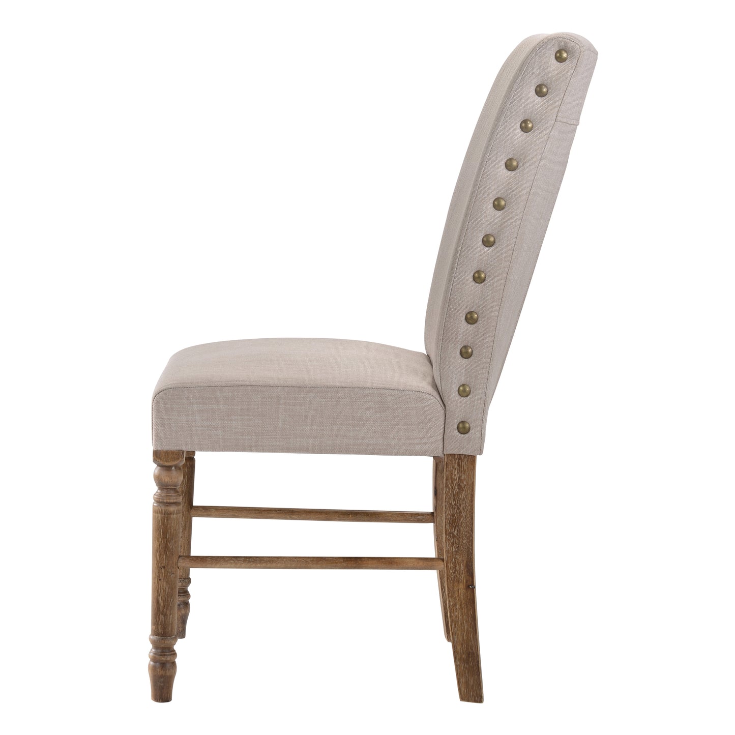 Tufted linen accent chair in neutral beige with antique brass nailhead trim and wooden spindle legs