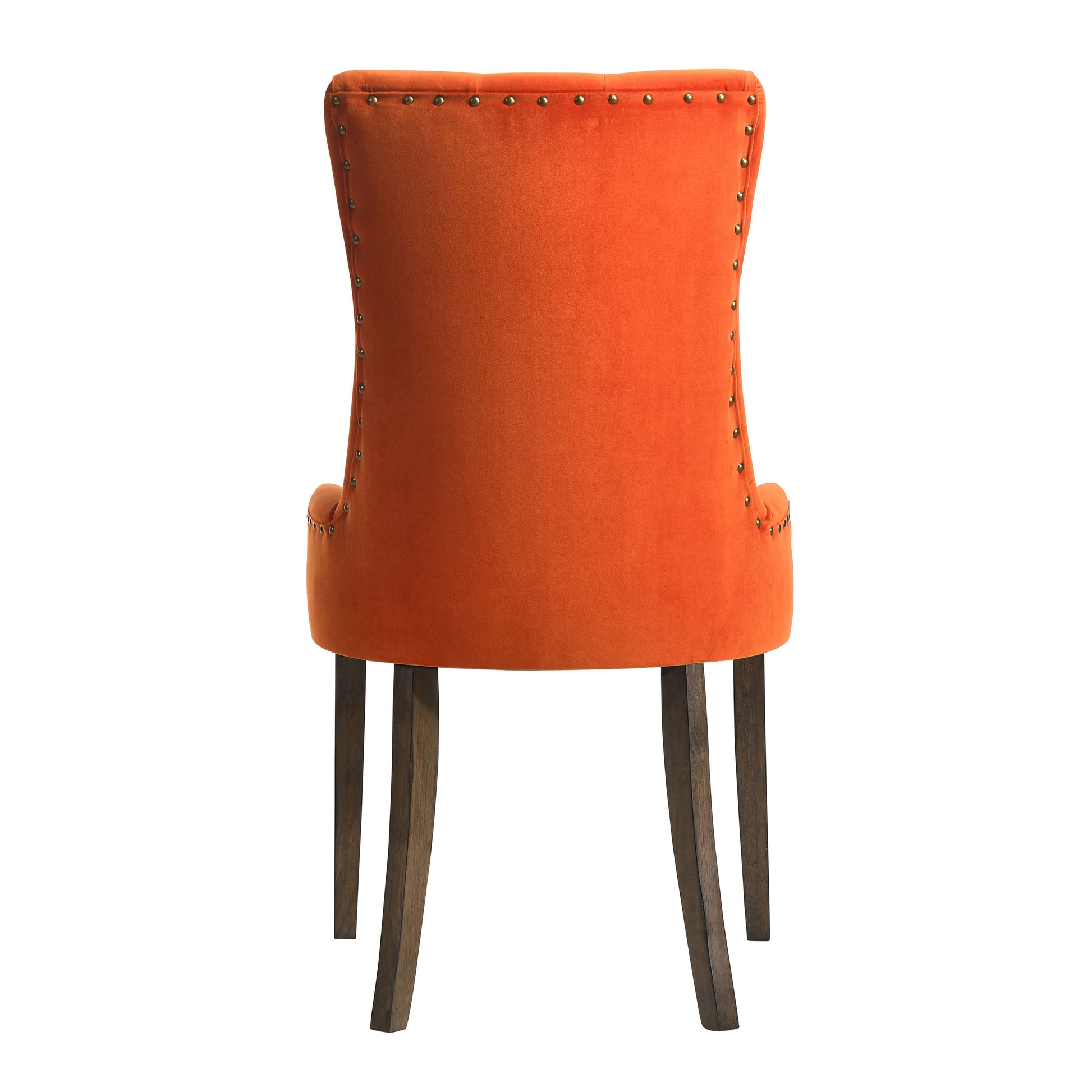 Orange velvet accent chair with brass nailhead trim and dark wood legs