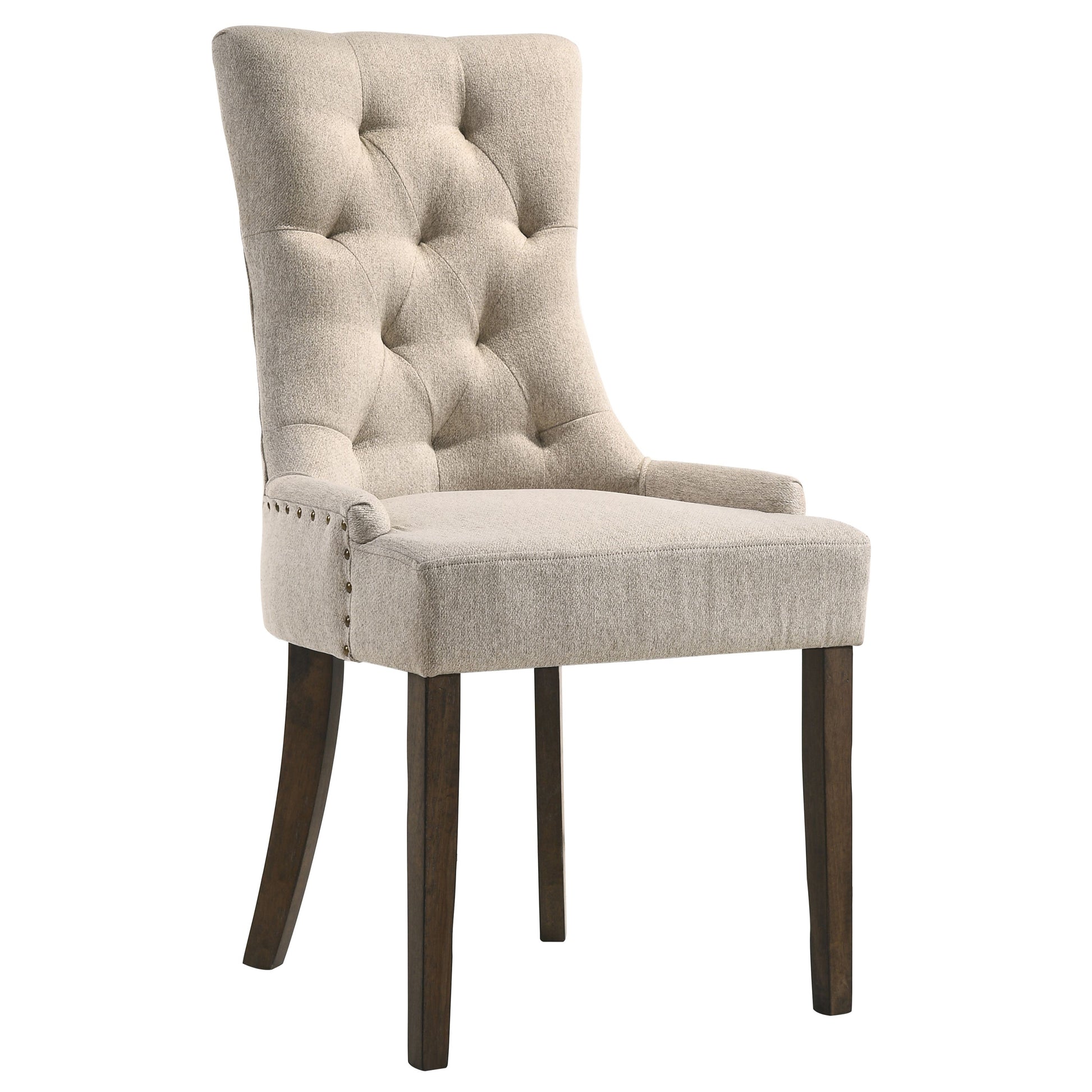 Tufted beige linen dining chair with dark wood legs and bronze nailhead trim