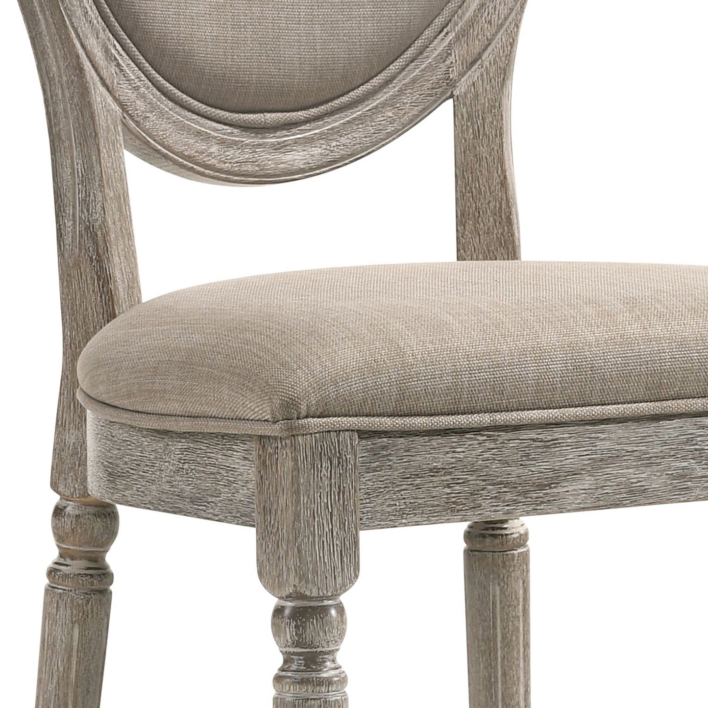 Closeup of a rustic oak dining chair with natural linen upholstery