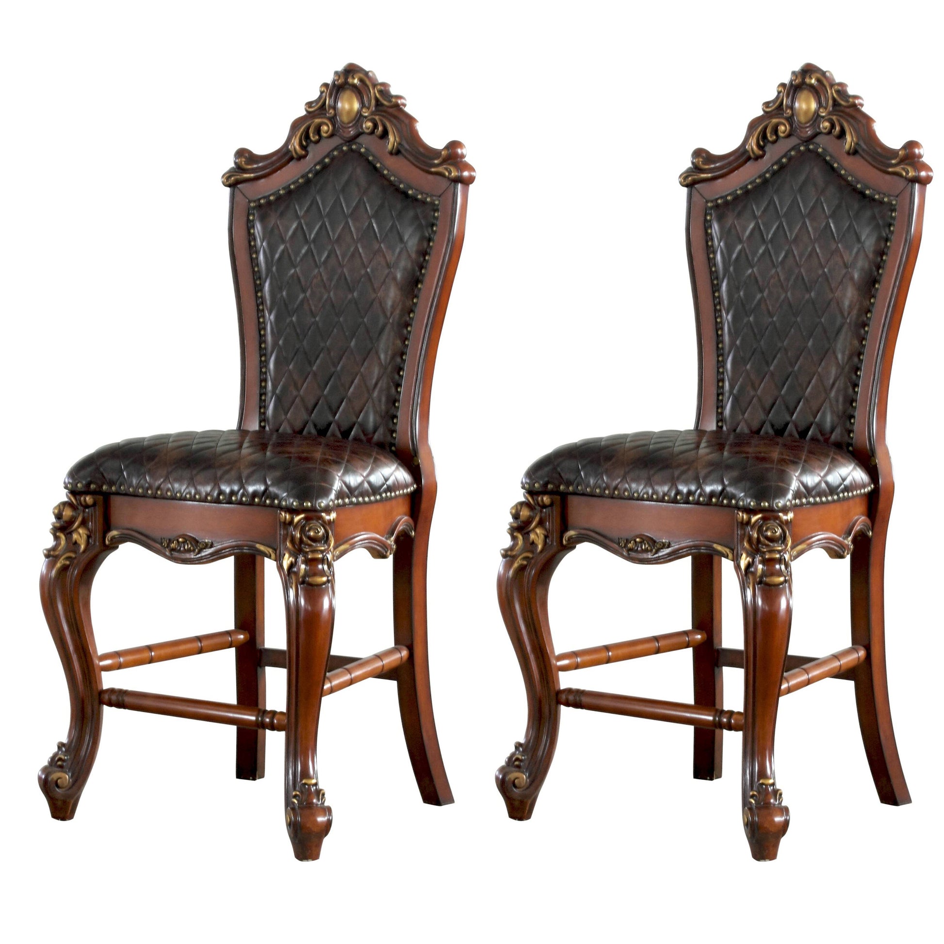 Two ornate dark brown tufted leather bar stools with carved wooden details and gold accents