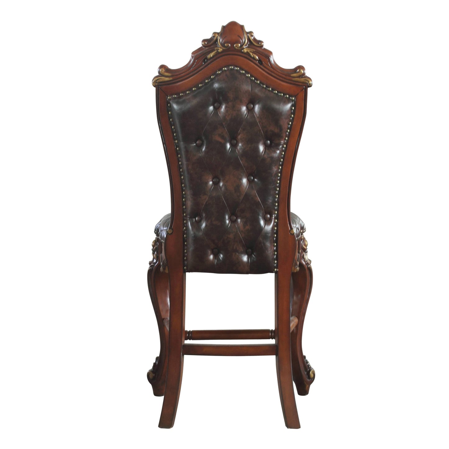 Luxury tufted armchair with dark brown leather upholstery and ornate mahogany wood frame