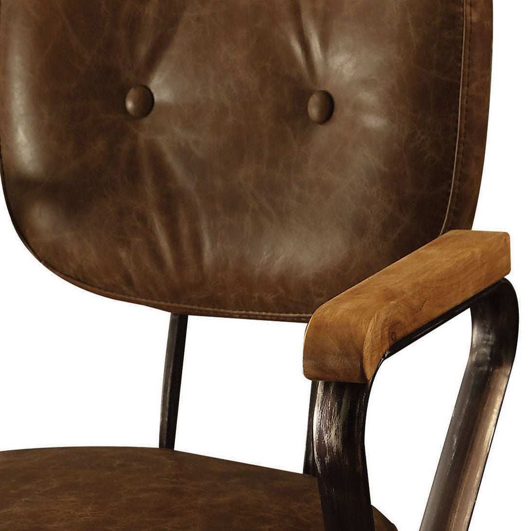 Rustic brown leather chair with tufted backrest and wooden armrests