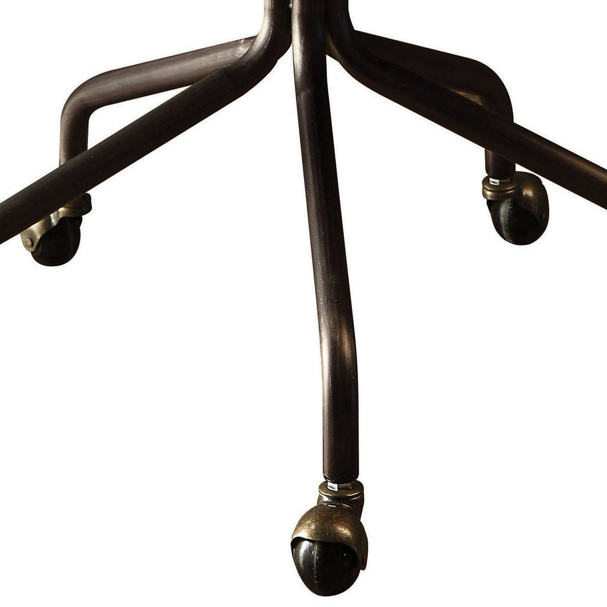 Antique brass caster wheels on a dark metal office chair base