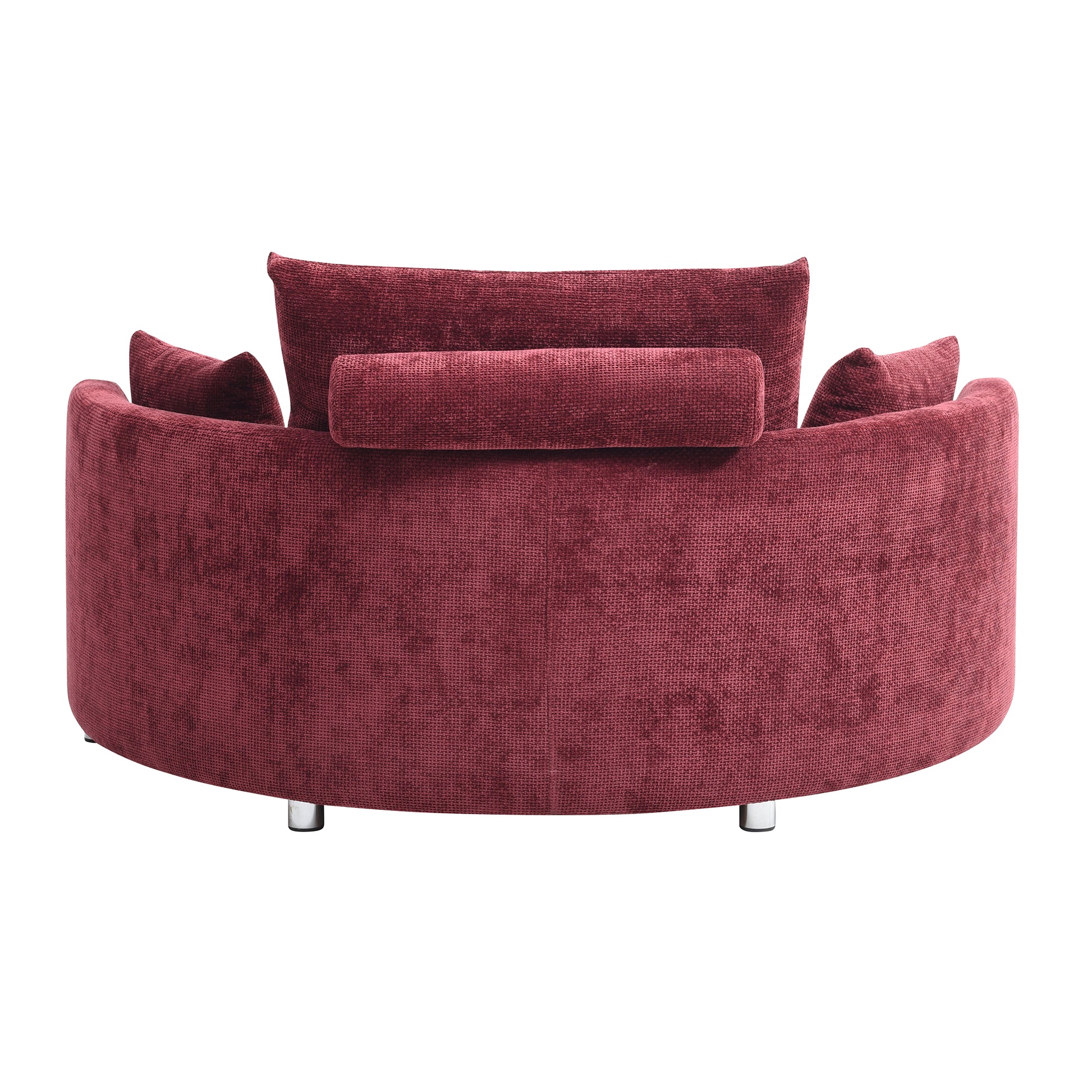 Curved burgundy velvet armchair with lumbar support pillow and accent pillows