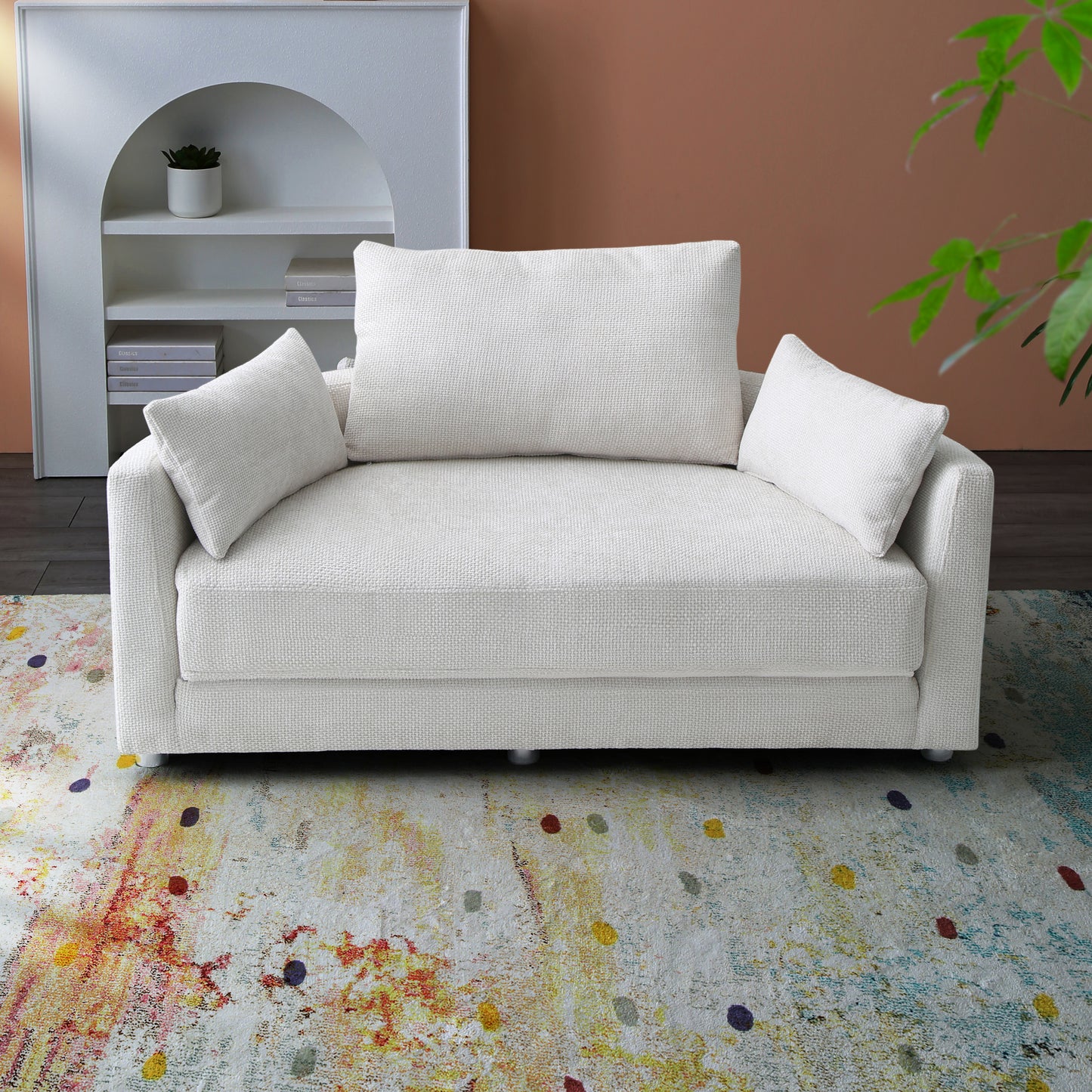 Cream textured fabric sofa with plush cushions and modern design