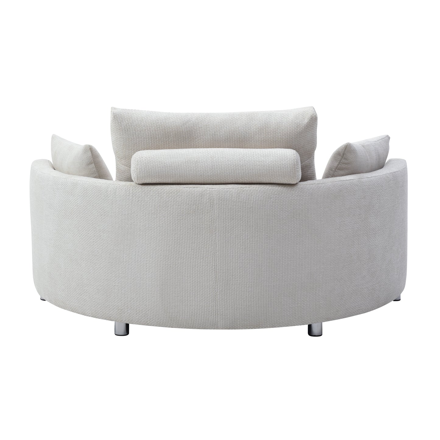 Curved cream fabric armchair with plush back cushions and silver legs