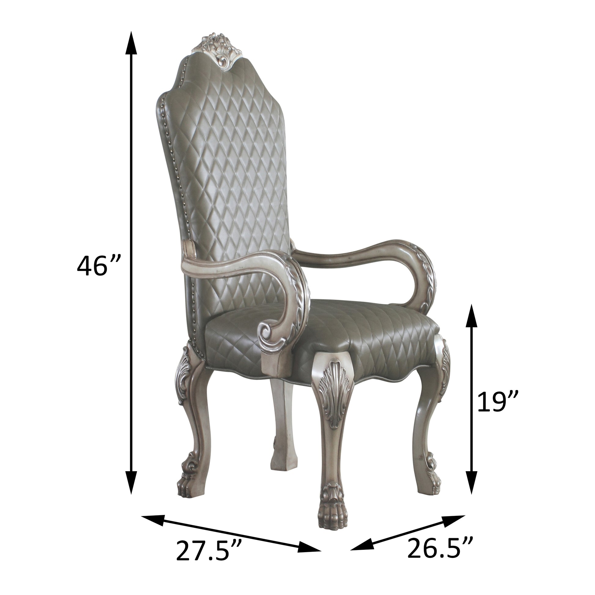 Luxury tufted dining chair in sage green with ornate silver accents and carved wooden legs