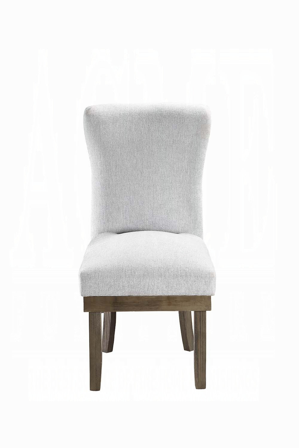 Light grey upholstered dining chair with wooden legs