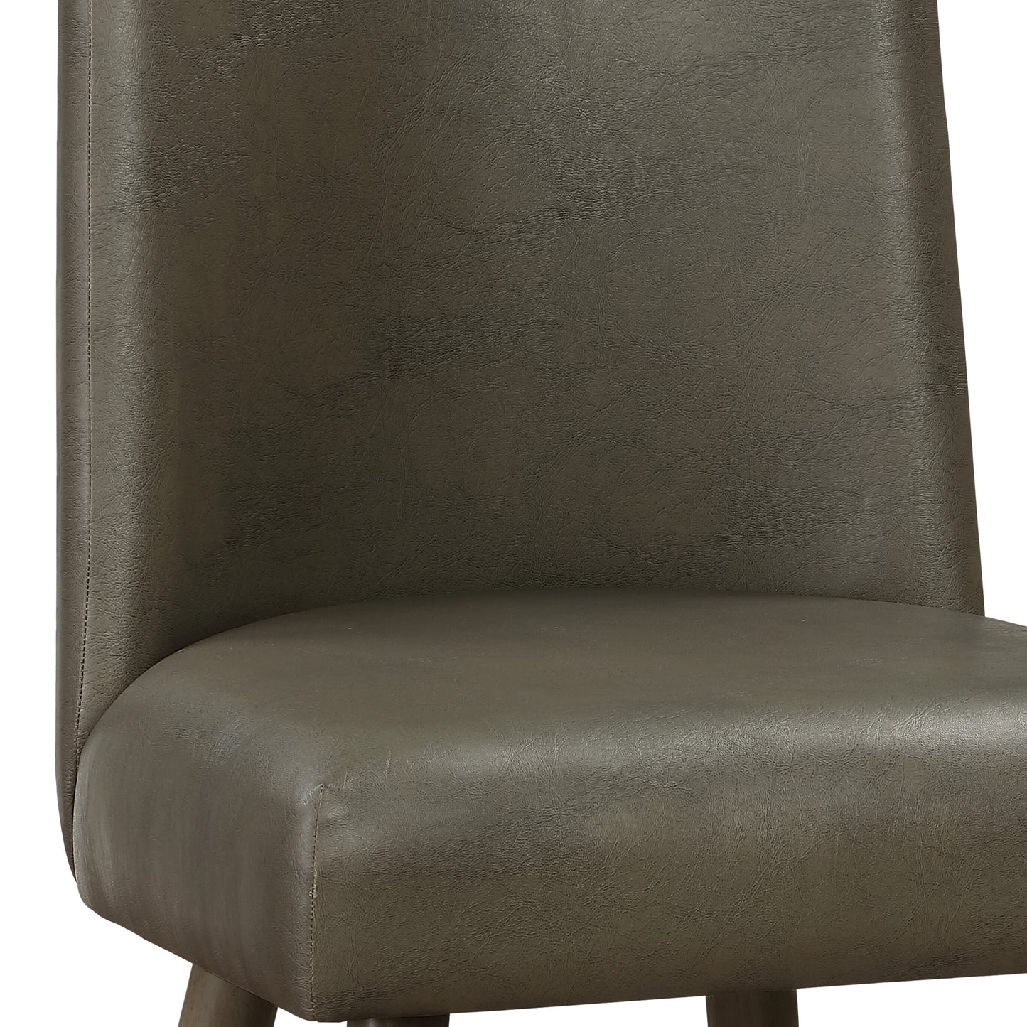 Closeup of a brown faux leather bar stool seat and back showcasing its textured finish