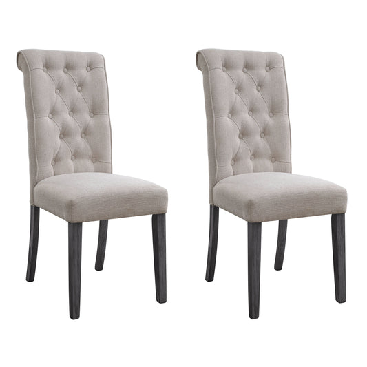 Two tufted upholstered dining chairs in light beige fabric with dark wood legs