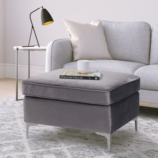 Plush grey velvet ottoman with modern silver legs ideal for footrest or extra seating