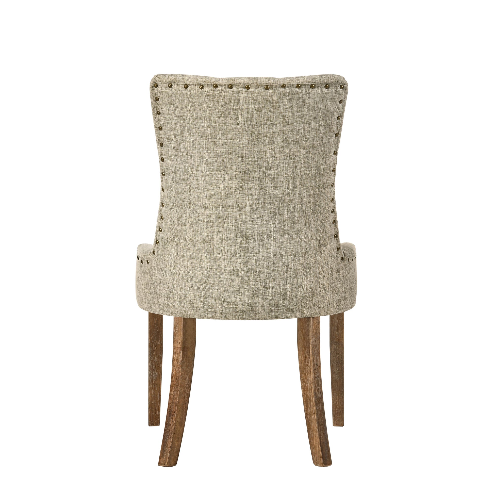 Tufted linen dining chair with bronze nailhead trim and wooden legs