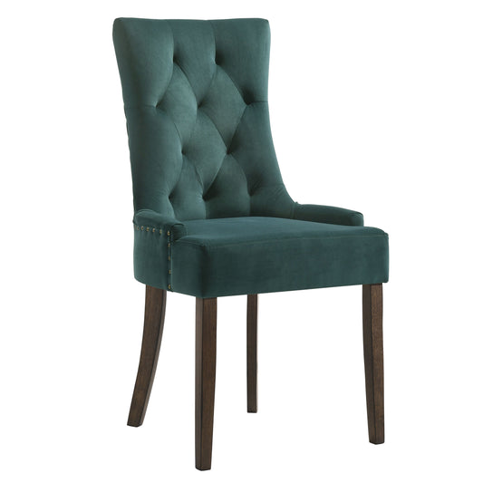 Deep teal velvet dining chair with button tufting and brass nailhead trim
