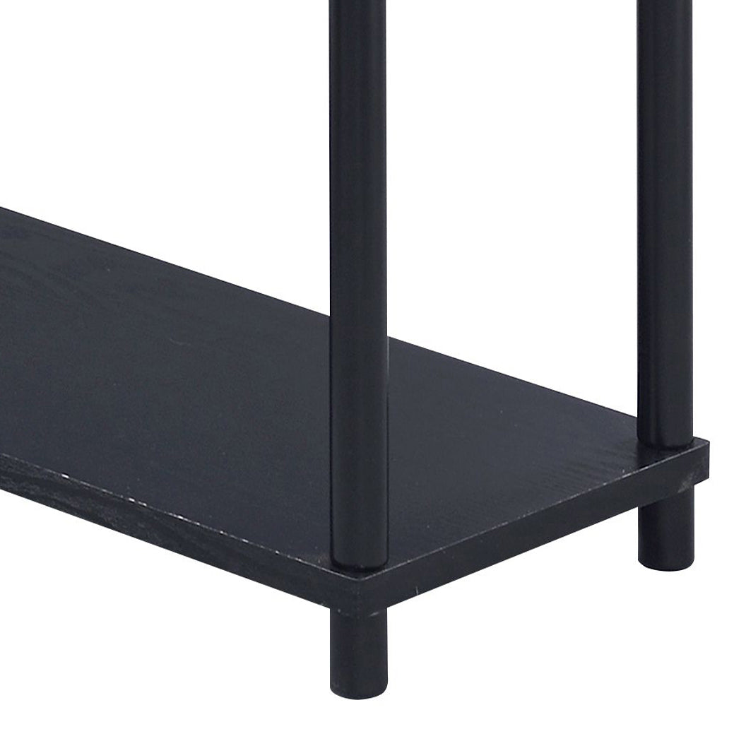 Black metal console table with a textured wood shelf showcasing modern minimalist design