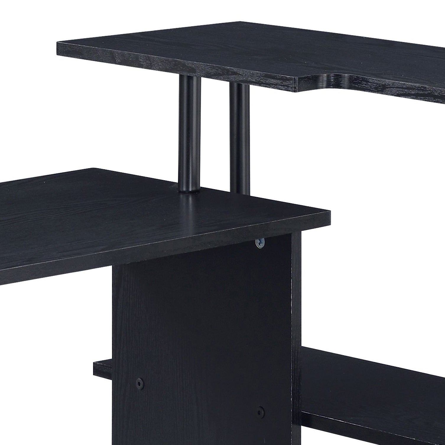 Closeup of a modern black particle board desk with multiple shelves