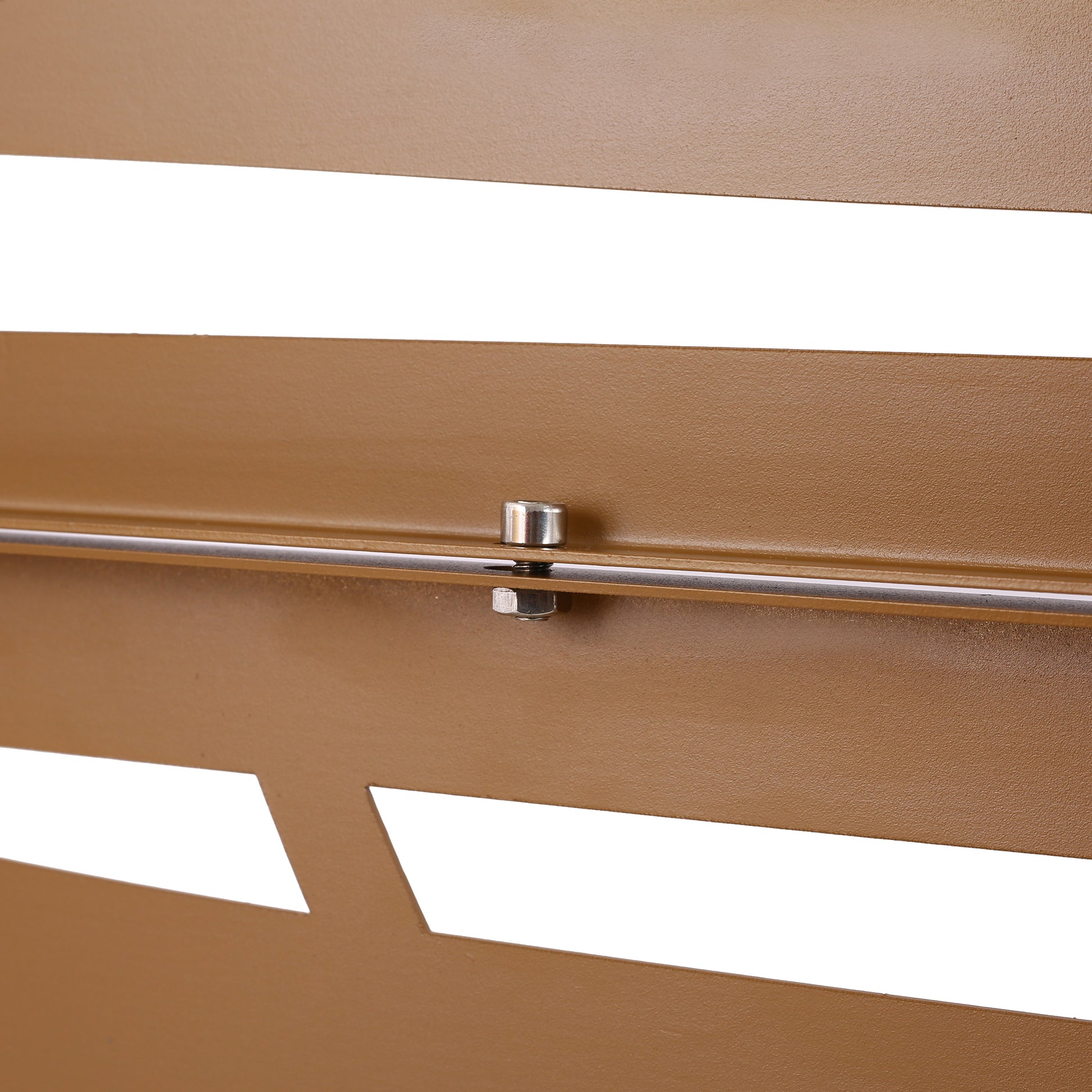 Closeup of a textured brown metal panel with a silver bolt securing two horizontal slats for modern outdoor furniture