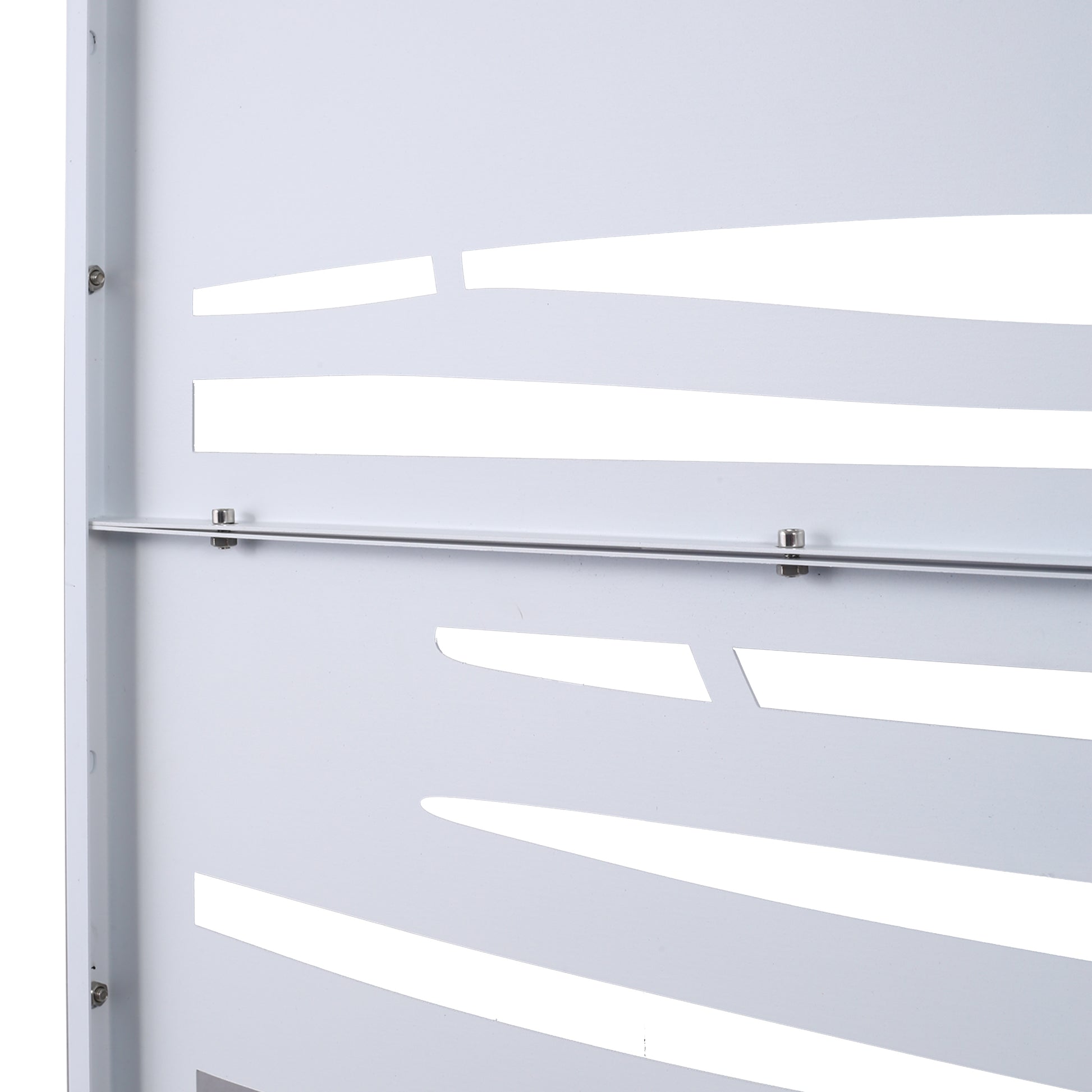 White metal radiator cover with decorative horizontal cutouts