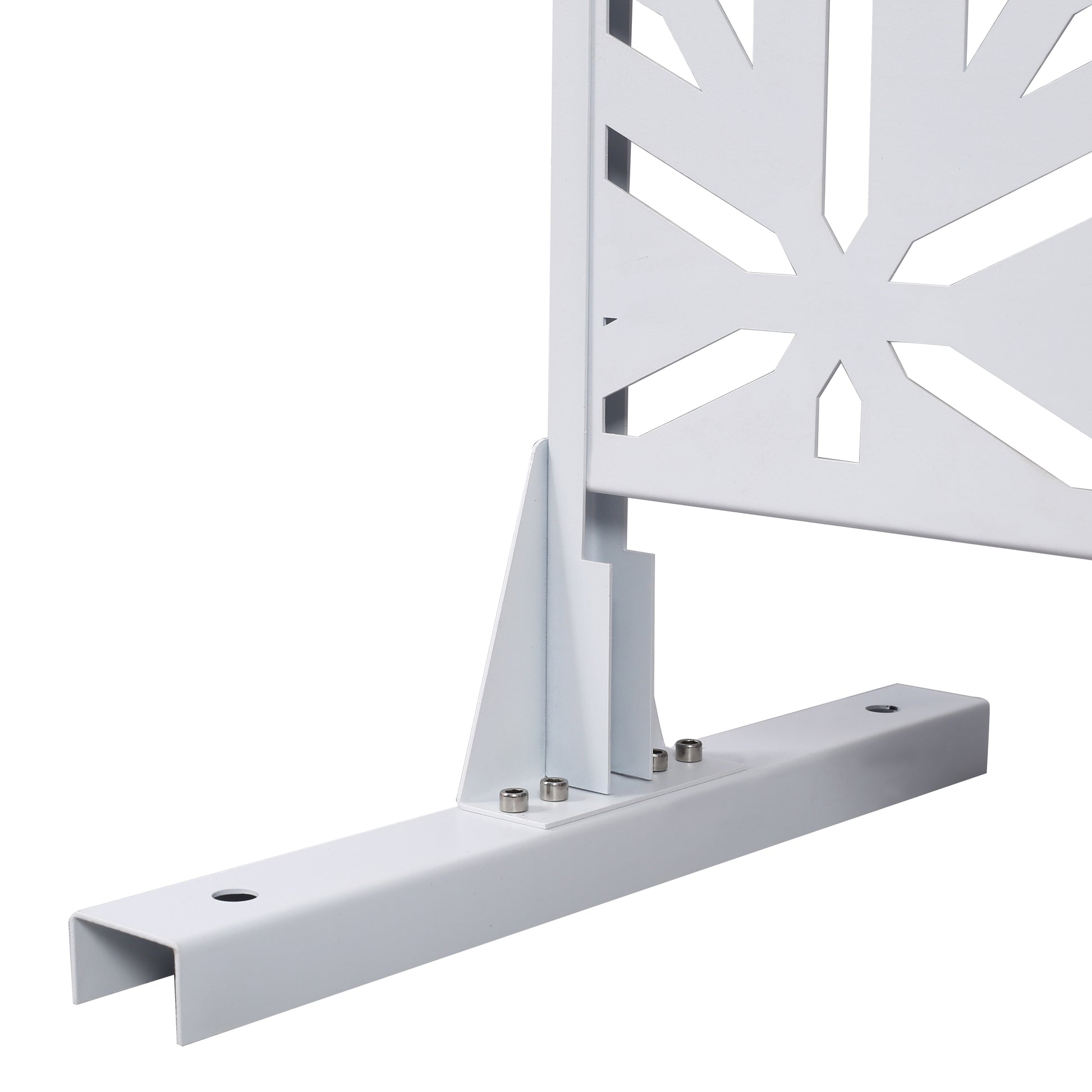 White metal garden screen with snowflake cutout design attached to a mounting base