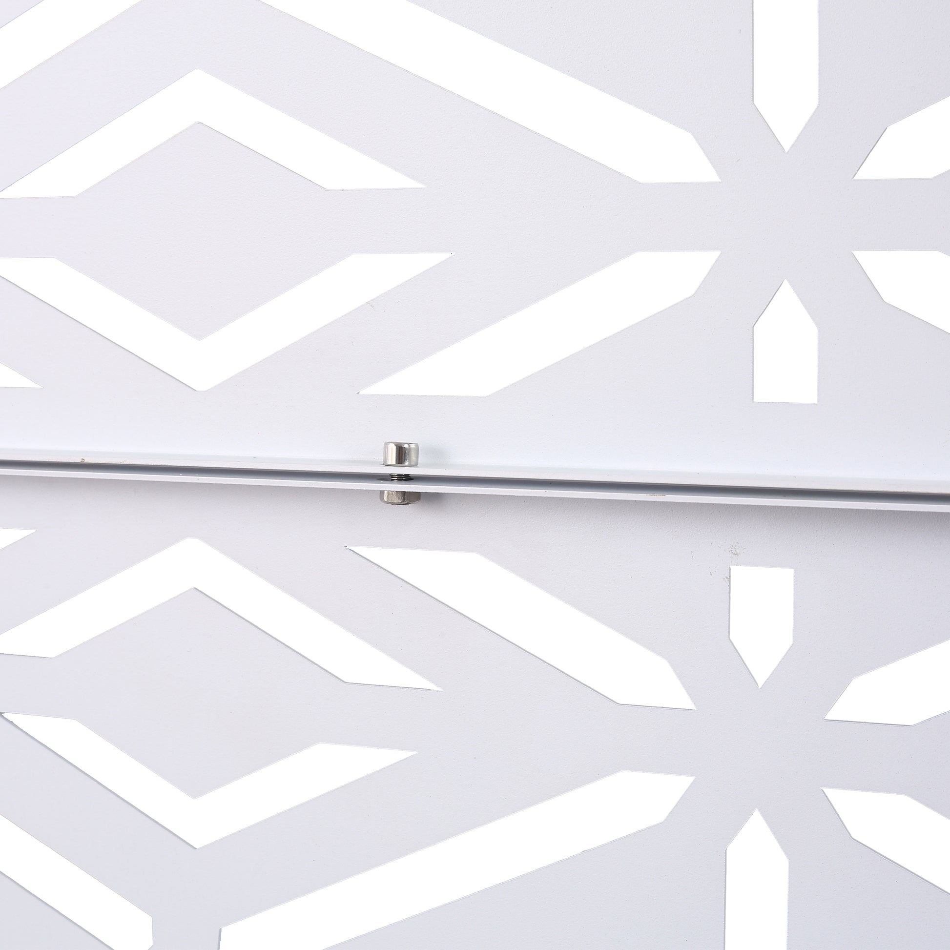 White metal decorative screen panel with geometric cutouts and a silver bolt