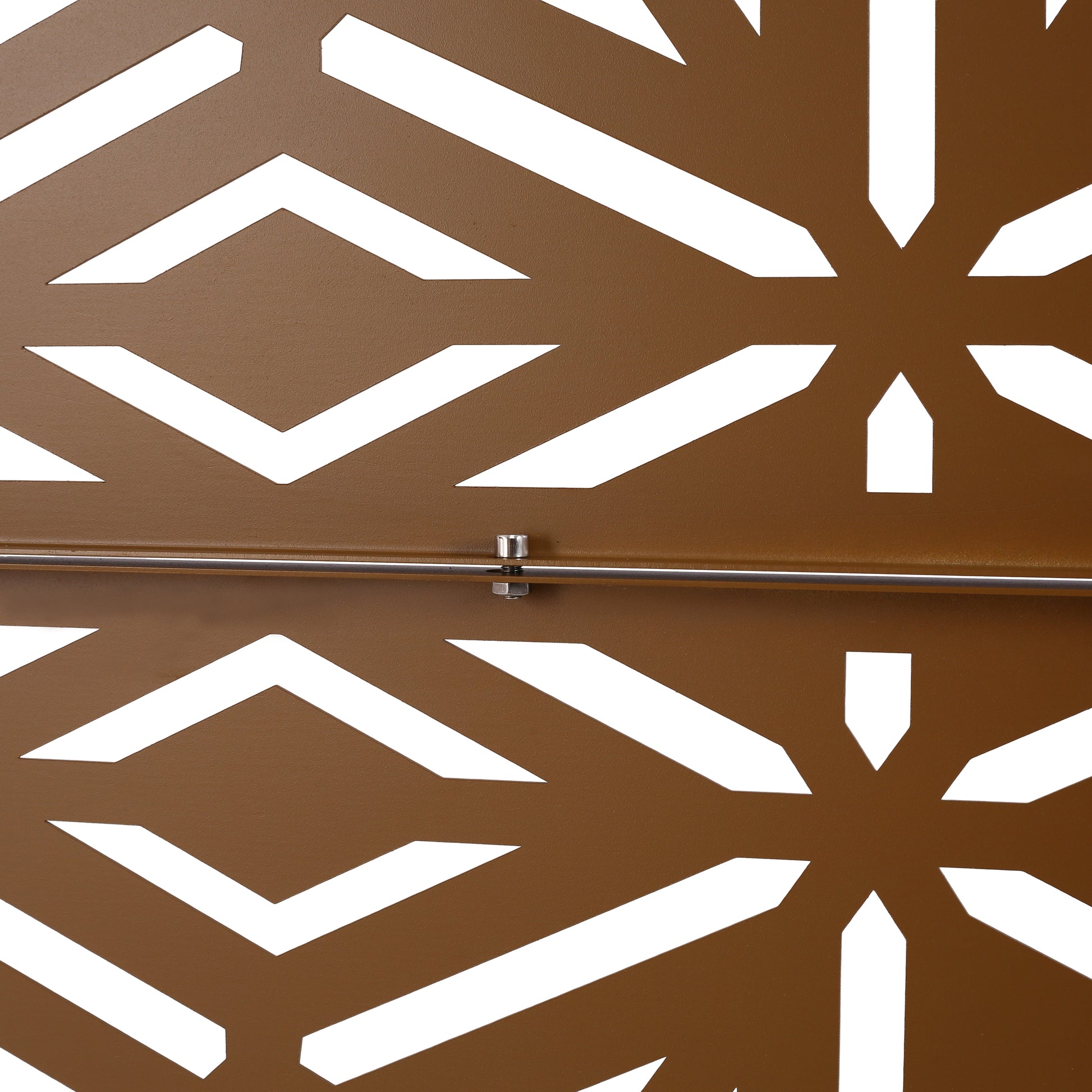 Bronze metal privacy screen with geometric cutout pattern