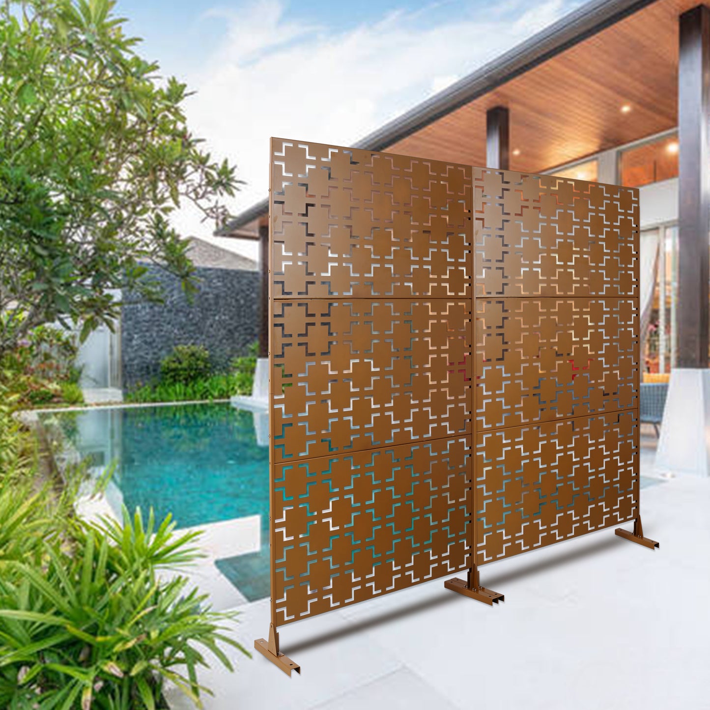 Bronze metal patio screen with geometric cutouts providing outdoor privacy and style