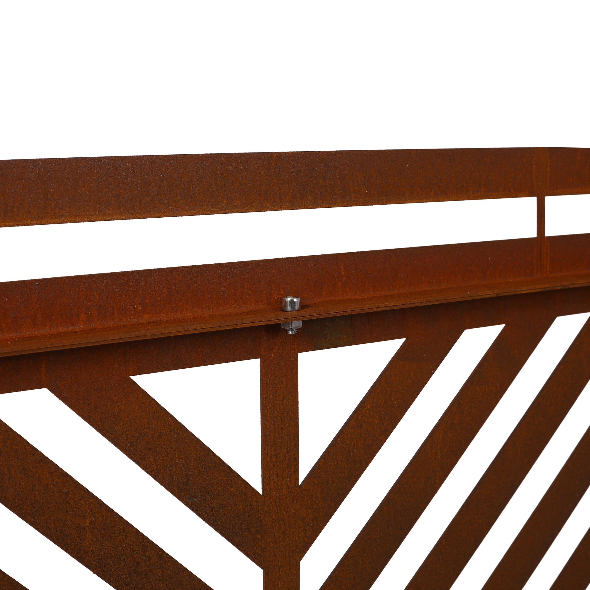 Closeup of a corten steel railing with a geometric pattern and rustic patina