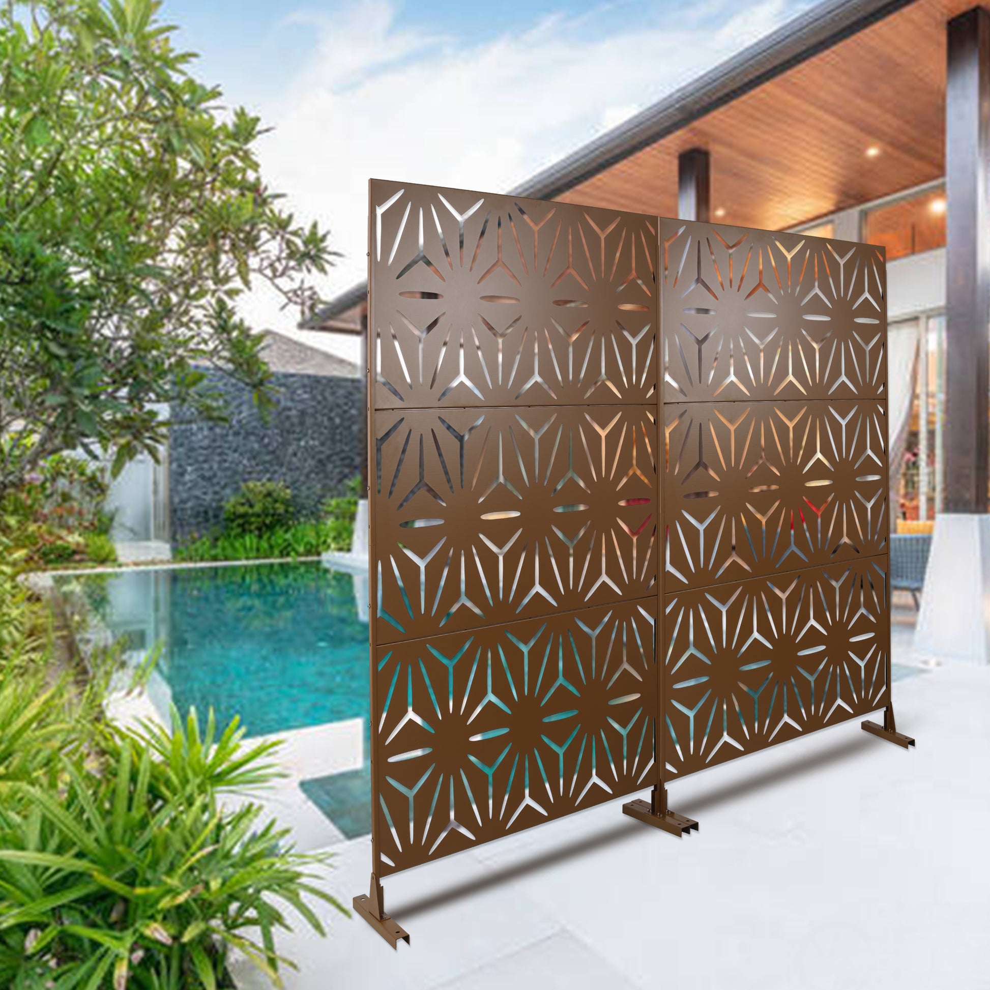 Bronze metal garden screen with geometric cutouts outdoor privacy panel