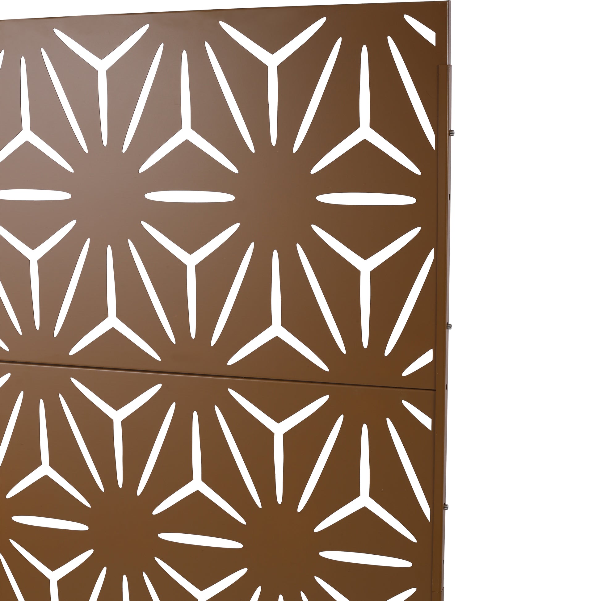 Bronze metal garden screen panel with a geometric starburst laser cut pattern